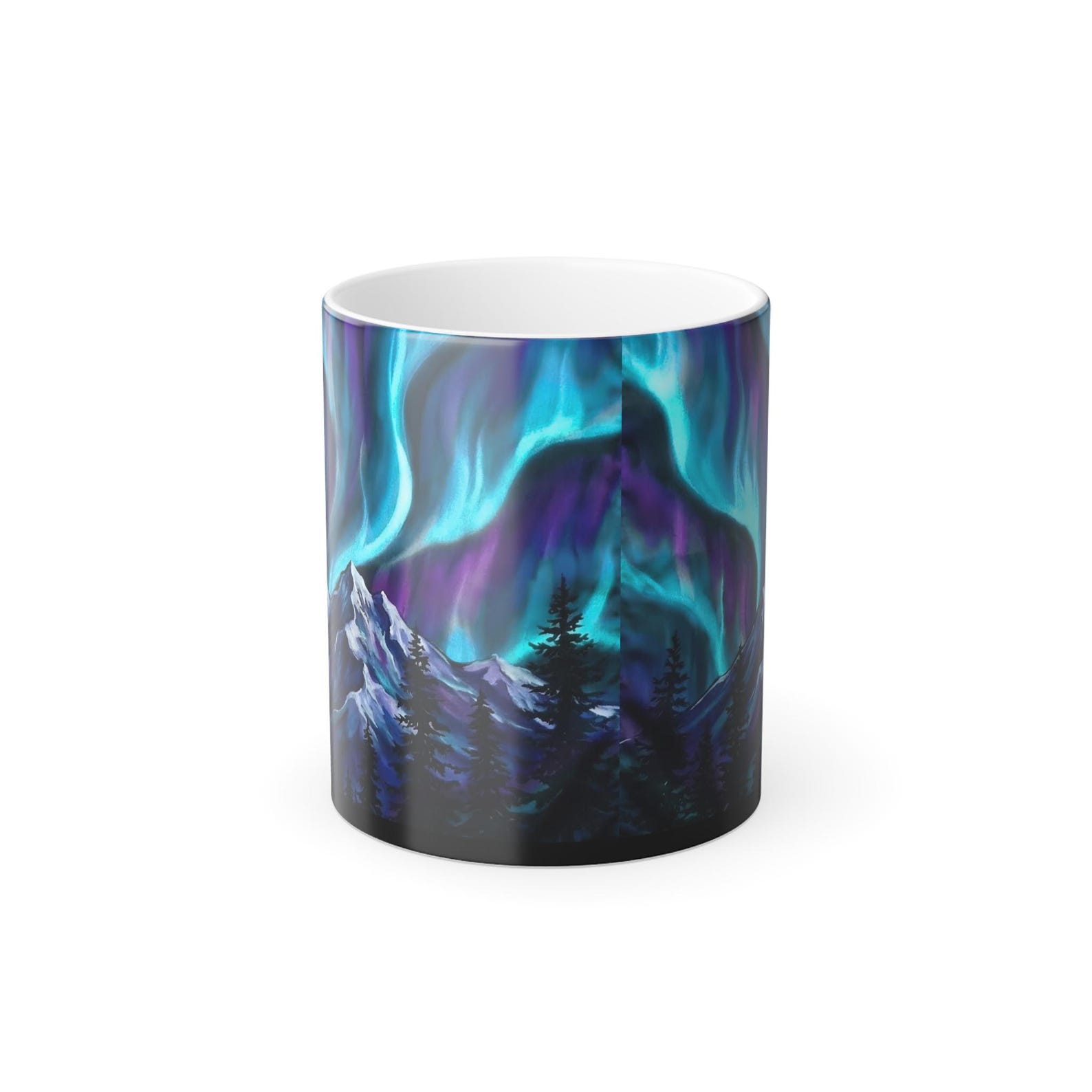 Studio shot of the color-changing mug showing the full aurora borealis and mountain design