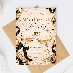 May include: A New Year's Eve party invitation card for 2027 featuring gold disco balls, champagne flutes with black ribbons, and gold confetti. The text reads: YOU'RE INVITED TO A NEW YEARS EVE Party 2027 SATURDAY DECEMBER 31ST 7:00 PM 1234 MAIN STREET CITY, STATE 12345 RSVP.