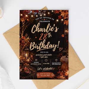 May include: A rectangular birthday invitation card featuring a dark autumn scene with string lights, pumpkins, and fall foliage. The text reads: You're invited to celebrate Charlie's 28th Birthday, Saturday October 18th, 6:00 PM, 1234 Main Street, City, State 12345.