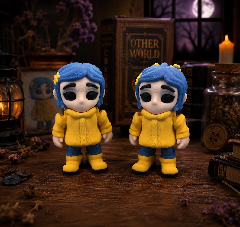May include: Two figurines of a character with blue hair, yellow coat, and blue pants. The figurines are standing on a wooden surface. The background includes a framed picture, a book, and a candle.