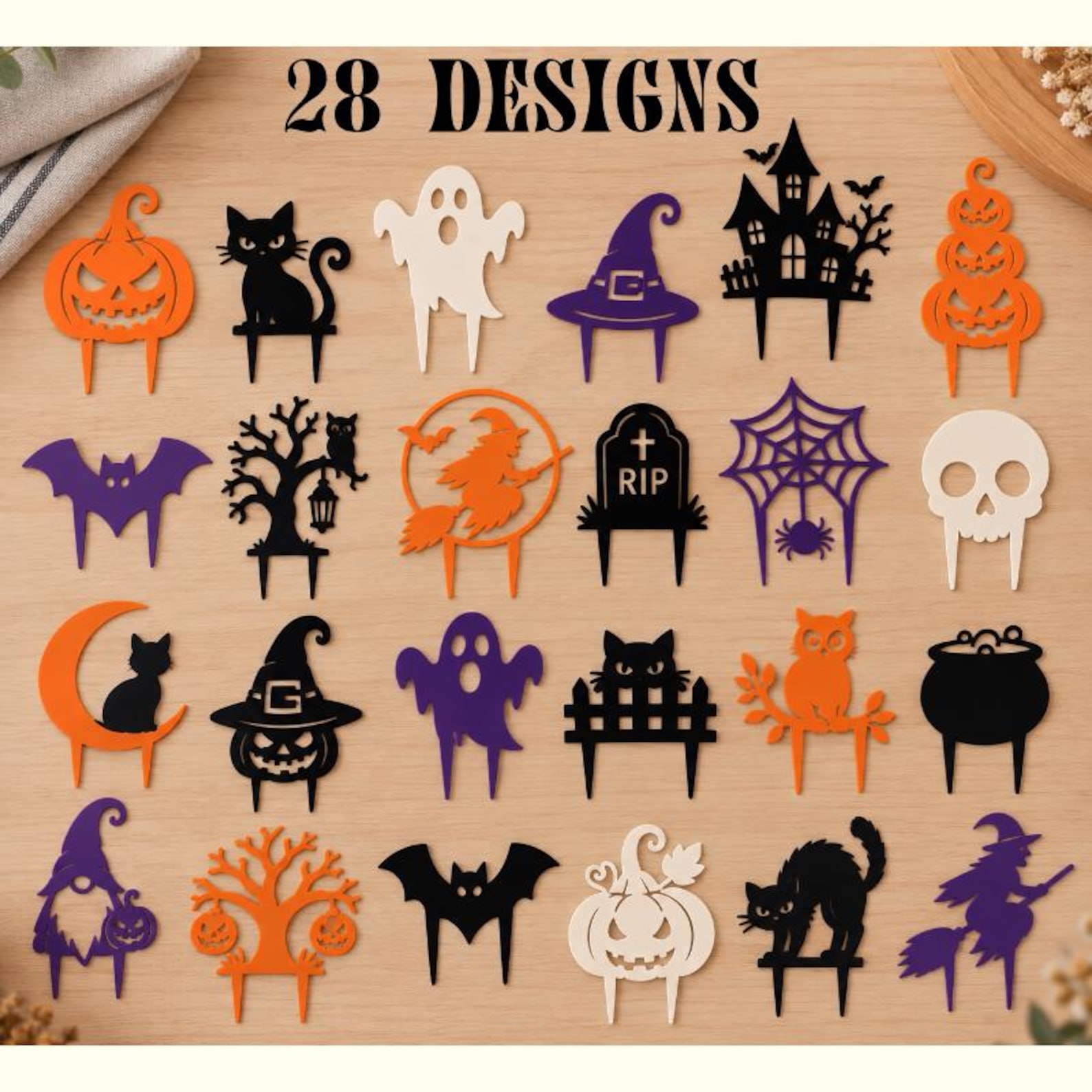 A Cut-File Assortment for a Dark Dessert Table Halloween cut-file preview with ghost, witch, pumpkin, spider and haunted-house topper shapes.