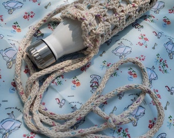 Porte-bouteille d’eau en nid d’abeille au crochet