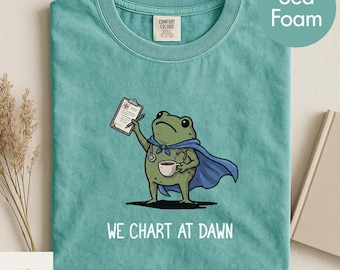 Comfort Colors We Chart At Dawn Nurse Shirt, Funny Frog Meme RN Tee, Nursing Humor TShirt, Registered Nurse Graduation Gift, ER Team Gifts
