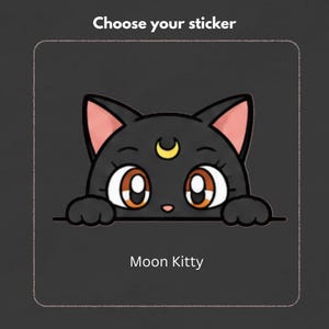 May include: A sticker featuring a black cat with large orange eyes, pink inner ears, and a yellow crescent moon symbol on its forehead. The cat is peeking over a horizontal line. The text above reads Choose your sticker and below reads Moon Kitty.