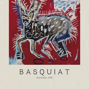 May include: A framed art print of Basquiat's "Red Rabbit, 1982." The painting shows a rabbit-like creature in black, white, and blue on a red backdrop. The artist's name and dates are printed below the artwork.