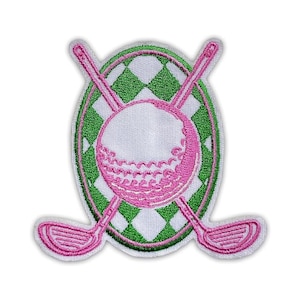 May include: Embroidered patch featuring a pink golf ball and two crossed golf clubs. The design is set against a white background with a green and white diamond pattern, all within a green and pink oval border.