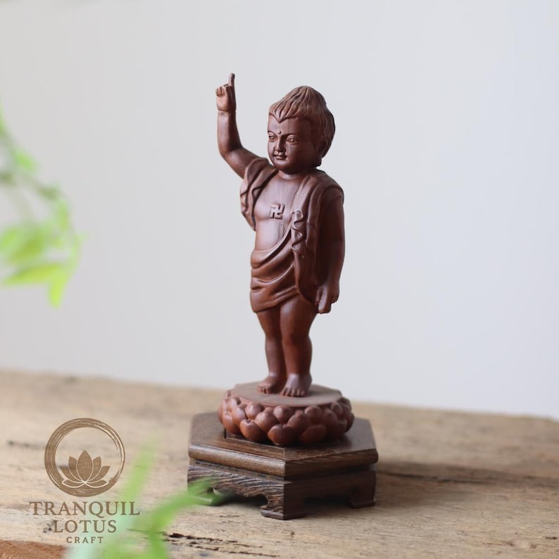 Small 4.7 inch (12cm) Hexagonal wooden pedestal holding a Baby Buddha statue. Ideal mini riser for displaying tea cups, palm stones, or small monk figures.