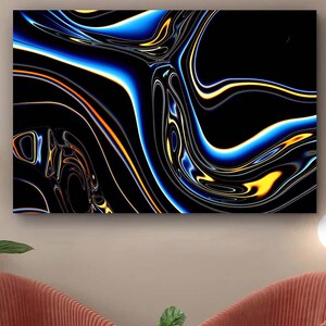 May include: Abstract art print featuring a swirling, liquid-like design. The artwork showcases a dark background with flowing patterns in shades of blue, orange, and yellow. The piece has a glossy, reflective appearance, creating a dynamic and modern aesthetic.