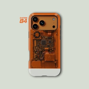 May include: A translucent orange smartphone case featuring a visible internal circuit board design, a small cooling fan, and a warning symbol. The text SYSTEM 84 is printed in orange on the left. The bottom section of the case is solid white.