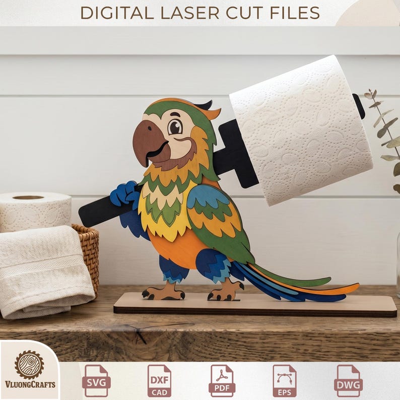 May include: A colorful wooden parrot toilet paper holder. The parrot has a brown beak, green, yellow, and orange feathers, and blue feet. The holder is holding a roll of white toilet paper. The text "DIGITAL LASER CUT FILES" is at the top.