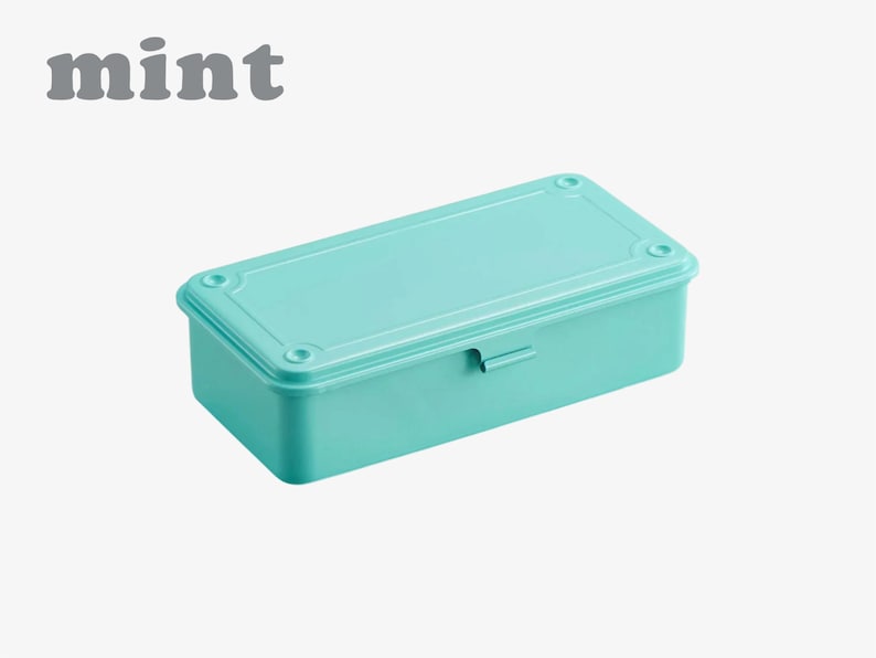 May include: A rectangular mint-colored storage box with a matching lid. The lid has rounded corners and is secured with a small metal clasp. The word "mint" is printed in gray, stylized text above the box.
