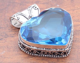 Handmade Sterling Silver Blue Topaz Heart Pendant | December Birthstone