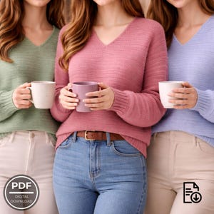 May include: Three people wearing V-neck sweaters in shades of green, pink, and lavender, holding mugs. They are wearing jeans and tan pants. The image has a soft, warm aesthetic, suggesting a cozy or lifestyle theme.