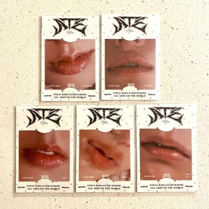 May include: Five Stray Kids photo cards with close-up images of lips. Each card has the Stray Kids logo and the text "Stray Kids Everywhere All Around The World." The cards also include the names Changbin, Hyunjin, Han, Felix, and I.N.