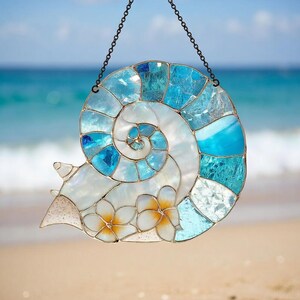 May include: A set of three ceramic mugs with a speckled, matte finish. The mugs are in shades of cream, light gray, and dark gray. Each mug has a simple, minimalist design, perfect for coffee or tea.