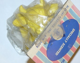 squeeze bulb jumping frog toy