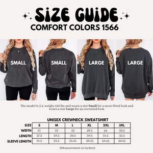 May include: Size guide for a unisex crewneck sweatshirt in Comfort Colors 1566. The image shows a model wearing a Small and Large size. The size chart includes measurements in inches (converted to cm) for width, length, and sleeve length, ranging from S to 3XL.