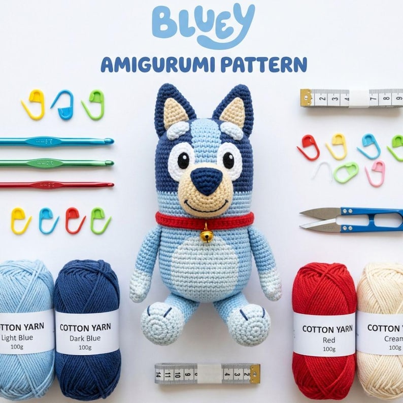 May include: A crocheted Bluey amigurumi pattern with yarn, crochet hooks, stitch markers, scissors, and a measuring tape. The Bluey doll is light blue, dark blue, and cream with a red collar. The image includes the text "BLUEY AMIGURUMI PATTERN".