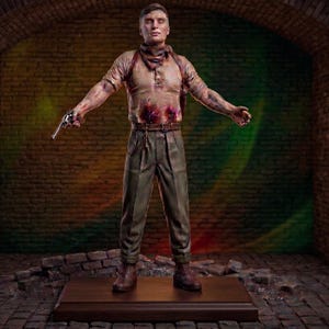 May include: A standing male figurine wearing a tan short-sleeved shirt, a neckerchief, and olive green trousers. The figure has visible red markings on the torso, holds a small silver-coloured handgun in the right hand, and wears brown boots.