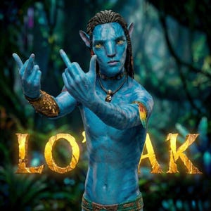 May include: A blue Na'vi character from the Avatar film franchise, with yellow eyes and braided hair, is shown with the words "LOK" and "AK" in gold lettering. The character wears a necklace and armbands, set against a lush, green backdrop.