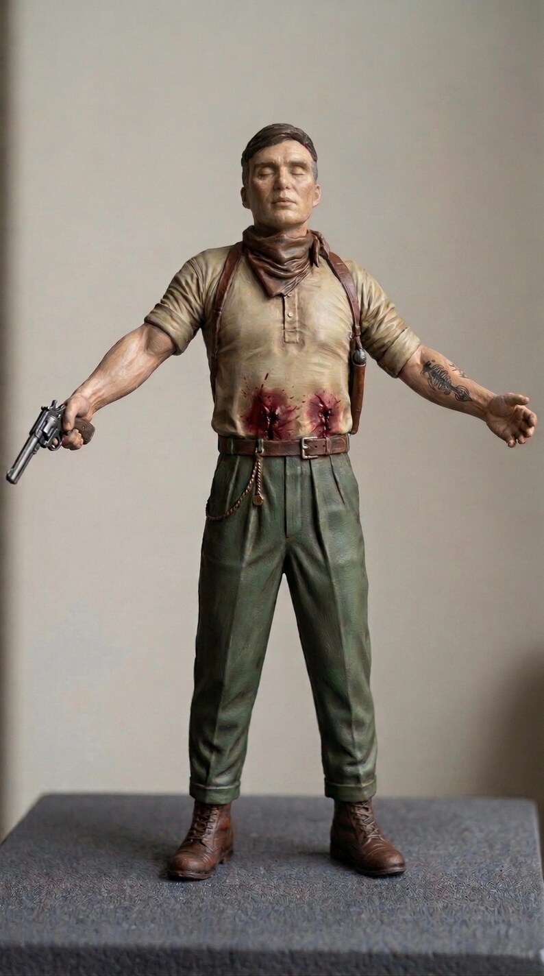 May include: A detailed figurine of a standing figure with short brown hair, wearing a beige short-sleeved shirt with two red blood-like marks on the torso, a brown neckerchief, green trousers, a brown belt with a chain, and brown boots, holding a revolver.