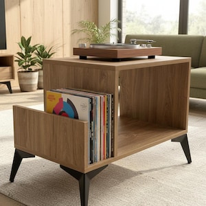 Small-space wooden vinyl stand pairing a turntable surface with compact LP storage in a minimalist form.