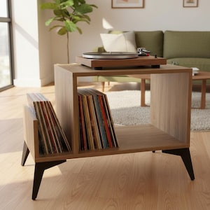 Small-space wooden vinyl stand pairing a turntable surface with compact LP storage in a minimalist form.