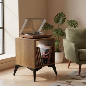 Small-space wooden vinyl stand pairing a turntable surface with compact LP storage in a minimalist form.