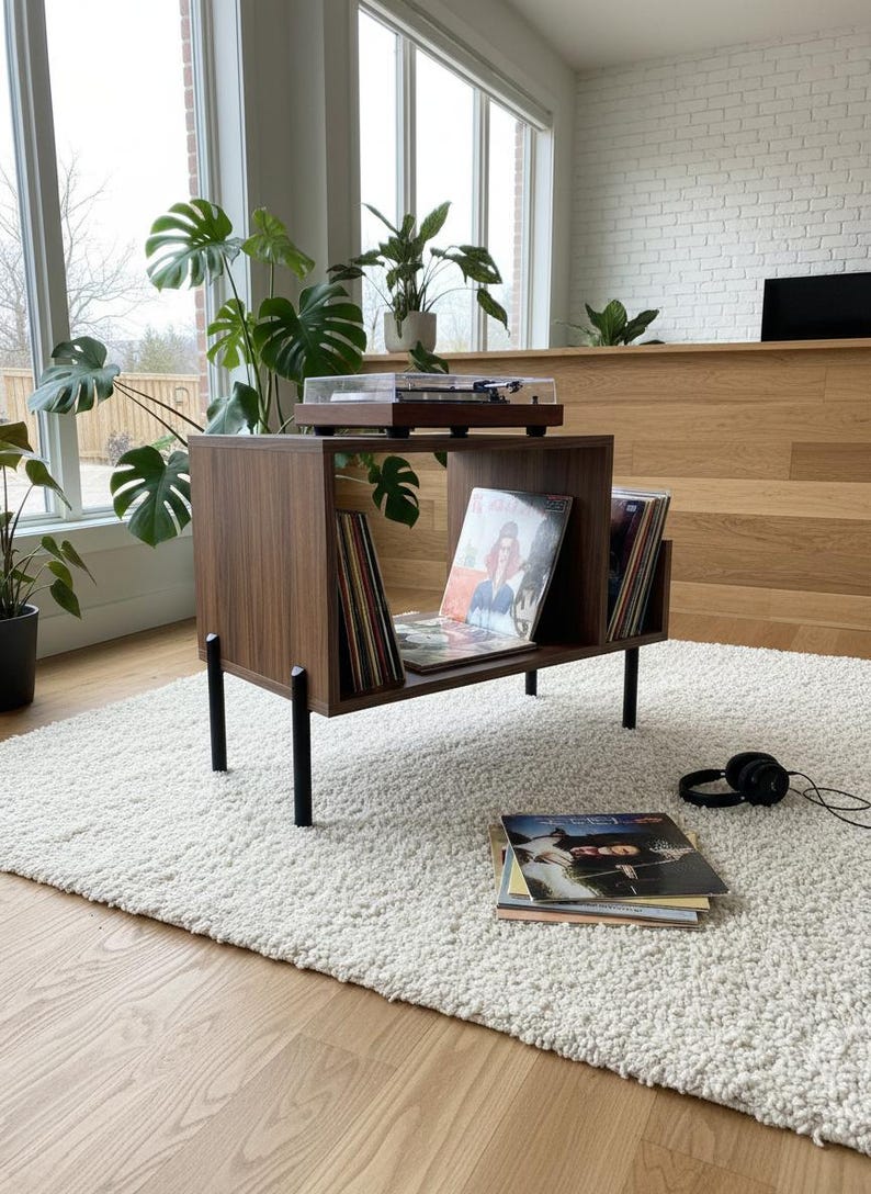Small-space wooden vinyl stand pairing a turntable surface with compact LP storage in a minimalist form.