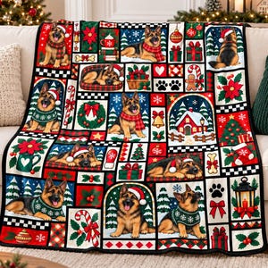 May include: A rectangular throw blanket featuring a patchwork design of German Shepherd dogs in various poses, wearing Santa hats and festive sweaters, interspersed with Christmas icons like ornaments, gifts, candy canes, and snowy scenes.