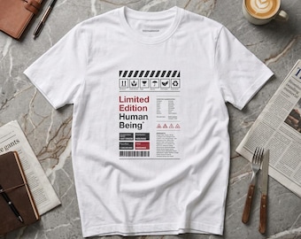 Camiseta de edición limitada con diseño de ser humano y etiqueta científica.