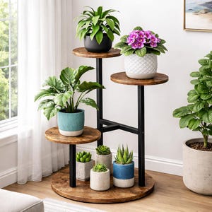 May include: A multi-tiered plant stand with a black metal frame and wooden shelves. The stand holds various potted plants, including a large-leafed plant in a turquoise pot, succulents, and a flowering plant with purple blooms. The stand is on a wooden floor.