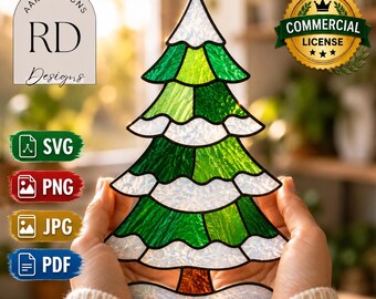 May include: A stained glass Christmas tree ornament featuring green glass panels and white textured glass representing snow on the branches. The design includes a brown trunk and a small metal loop at the top for hanging. Text includes AARHDESIGNS RD Designs, SVG, PNG, JPG, PDF, and Commercial License.