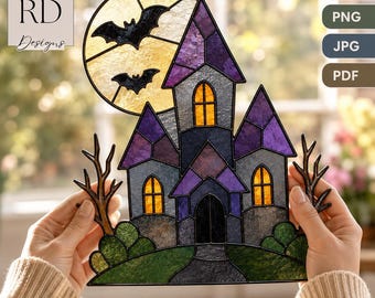 May include: A stained glass-style haunted house decoration featuring a yellow moon with two black bats, purple and gray roof sections, orange-lit windows, and bare tree silhouettes. The design includes text labels for SVG, PNG, JPG, and PDF files.