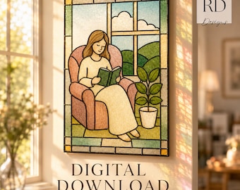 May include: A rectangular stained glass style wall hanging featuring a person sitting in a pink armchair reading a green book. The scene includes a window view of green hills, a potted plant, and a grid frame. Text reads DIGITAL DOWNLOAD.