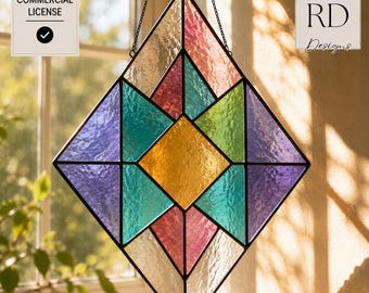 May include: A diamond-shaped stained glass suncatcher featuring a geometric pattern of textured glass panels in shades of purple, teal, lime green, yellow, and pink, all framed in black metal lines and suspended by a thin black metal chain.