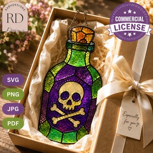 Halloween poison bottle stained glass suncatcher presented in an elegant gift box with tissue paper and ribbon, featuring a skull and crossbones in vibrant purple and green textured glass with a golden cork. Beginner-friendly digital download includes SVG, PNG, JPG, and PDF files with a commercial license, perfect for DIY stained glass projects, spooky Halloween décor, gothic home decorations, handmade gifts, witchy crafts, and seasonal window art.