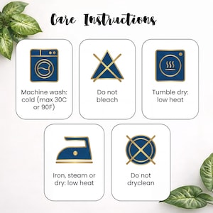 May include: Care instructions graphic with five icons. Includes machine wash cold (max 30C or 90F), do not bleach, tumble dry low heat, iron steam or dry low heat, and do not dry clean. The text is in black, and the icons are blue and gold.