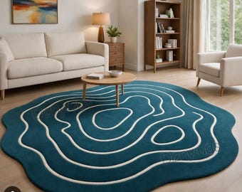 Blauwgroen abstract contourtapijt – onregelmatige organische vorm, handgetuft tapijt