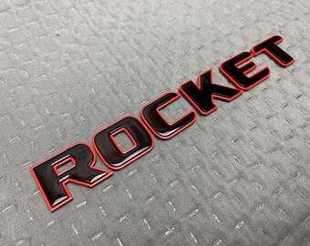 Badge arrière fusée noir avec bordure rouge pour Mercedes-benz