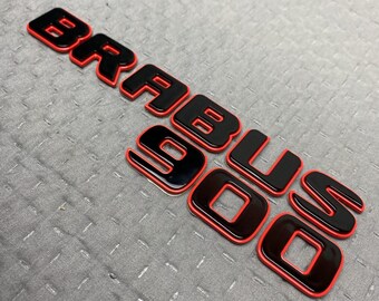 Insigne métallique Brabus 900 avec garniture rouge pour coffre Mercedes G Wagon