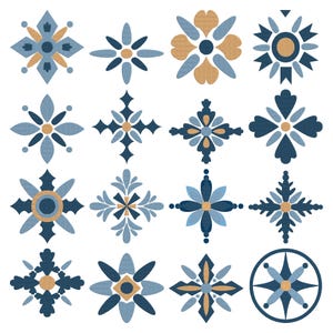 May include: A collection of sixteen distinct geometric and floral-inspired motifs arranged in a grid. Each design features a color palette of navy blue, light blue, and tan, with symmetrical patterns including star, petal, and cross shapes.