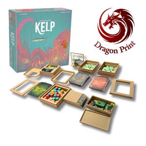 May include: The Kelp board game box features a teal cover with a red octopus illustration and the text Kelp. The set includes multiple tan cardboard trays, stacks of illustrated cards, small colourful dice, and a small shark figure on a stand.
