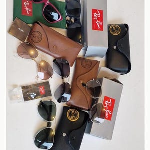 Colección de gafas de sol Ray-Ban, modelos icónicos Pilot y Wayfarer, artículos de colección vintage de Ray-Ban. imagen 1
