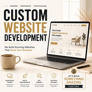 May include: A silver laptop displaying a website design with the text Custom Website Development, We Build Stunning Websites That Grow Your Business, and Let's Build Something Amazing Together, alongside a beige mug and a black pen on a desk.