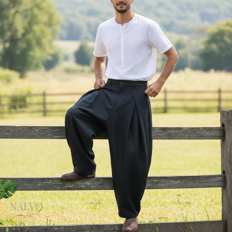 Black elegant wide leg trousers for men with lightweight fabric, modern resort and beach style