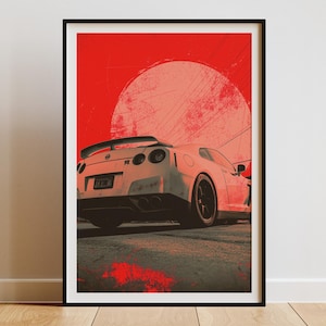 Puede incluir: Impresión artística enmarcada que presenta un coche deportivo blanco con alerón, sobre un fondo rojo vibrante con un diseño de sol texturizado. El coche está en una carretera oscura, creando una composición dinámica.