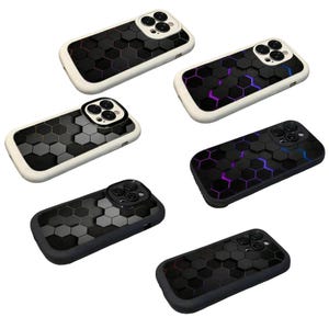 May include: A selection of smartphone cases with a geometric honeycomb design. The cases display a range of colours, including black, white, and grey, with some featuring vibrant purple and blue highlights. The cases are designed to fit a smartphone.