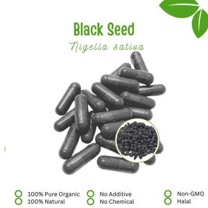 May include: Black Seed capsules and seeds are displayed on a white background. The text "Black Seed Nigella sativa" is in green. Additional text states "100% Pure Organic, 100% Natural, No Additive, No Chemical, Non-GMO, Halal."