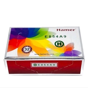 May include: A rectangular box of Hamer candies. The box has a white top with a colorful abstract design and the text "Hamer" and "E854A9". The box also has a red bottom with the text "H E854 A9". The box contains 32 candies.